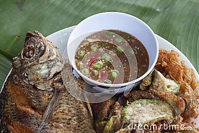 Shrimp Paste Chili Sauce, Fried tilapia and Eggplant wattle omelettes Thai people call Nam Prik Kapi. Stock Photo