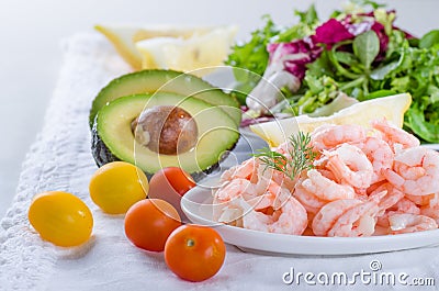 Shrimp salad ingredients - cooked, peeled shrimps, salad, tomato Stock Photo