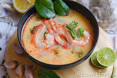 Shrimp soup bowl, seafood soup with shrimps prawns in the restaurant, Traditional thai cuisine hot spicy soup shrimp curry with Stock Photo