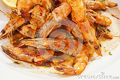 Shrimps prepared with garlic, chilli and white wine Stock Photo