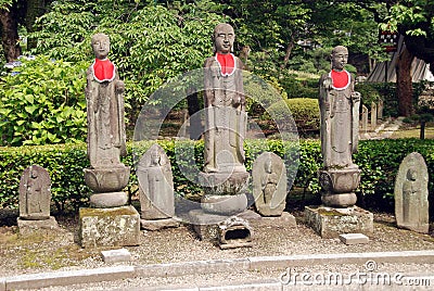 Shrine statues in Japan Stock Photo