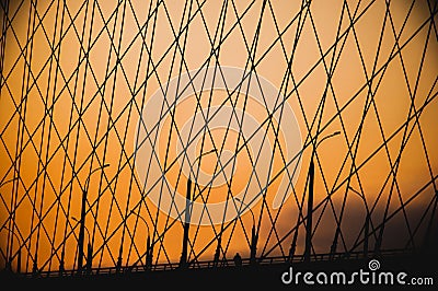 Shrouds bridge at sunset silhouette lanterns Stock Photo