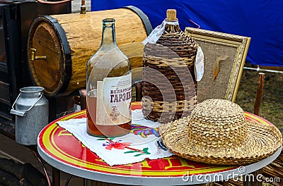 Shrovetide festivities. Bottles with Belorussian moonshine Editorial Stock Photo