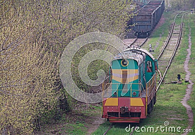 Shunting diesel locomotive standing on the siding Stock Photo