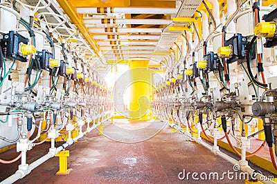 Actuated ball valve header at offshore oil and gas remote platform. Stock Photo