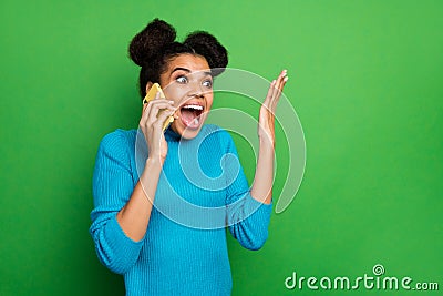 Shut up. Photo of astonished excited dark skin lady hold telephone speaking chatting friends listen fresh news gossips Stock Photo