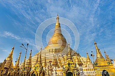 Shwedagon golden pagoda on blue sky background Stock Photo