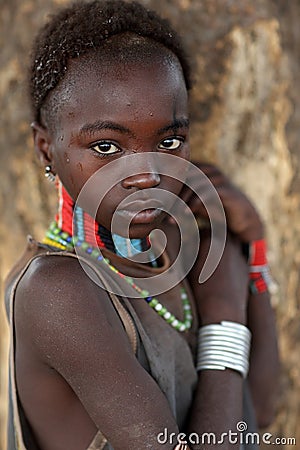 Shy young Hamer girl in South Omo, Ethiopia Editorial Stock Photo