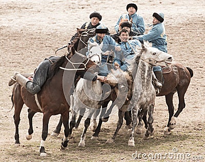 Shymkent, KAZAKHSTAN - 22 March 2017: Celebration of the Kazakh holiday NARIYZ. Competitions on horses Editorial Stock Photo