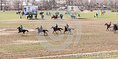 Shymkent, KAZAKHSTAN - 22 March 2017: Celebration of the Kazakh holiday NARIYZ. Competitions on horses Editorial Stock Photo