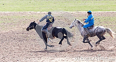 Shymkent, KAZAKHSTAN - 22 March 2017: Celebration of the Kazakh holiday NARIYZ. Competitions on horses Editorial Stock Photo