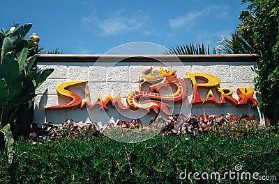 The Siam Park logo sign between a green plant in Tenerife, Spain Editorial Stock Photo