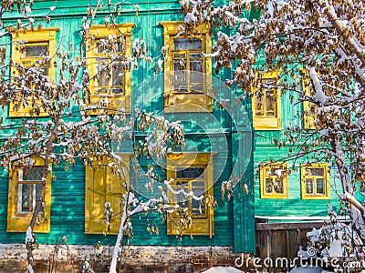 Siberian colored wooden house Stock Photo