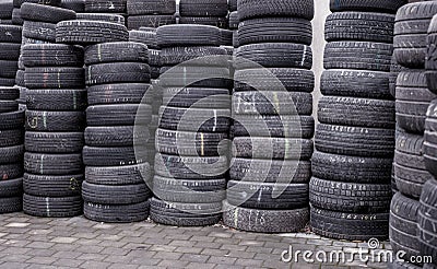 Used tire stacks in Workshop Editorial Stock Photo