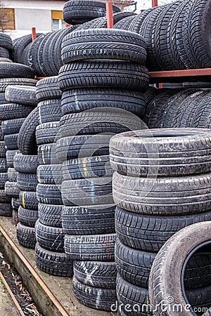 Used tire stacks in Workshop Editorial Stock Photo