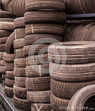 Used tire stacks in Workshop Editorial Stock Photo