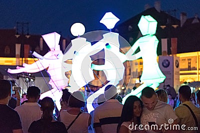 SIBIU, ROMANIA - 17 JUNE 2016: Members of the Light Dancers group performing during Sibiu International Theatre Festival, Sibiu, R Editorial Stock Photo