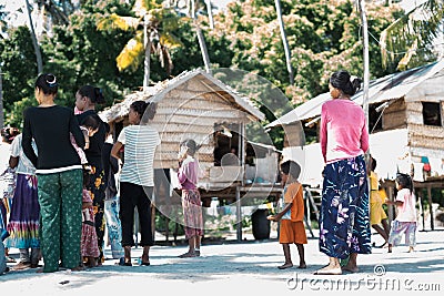 Sibuan, Malaysia - November 26, 2019: Bajau Laut people in their village in Sibuan island, aSemporna. They inhabit villages on the Editorial Stock Photo
