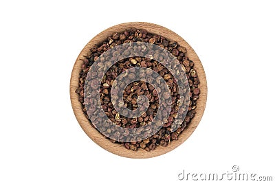 Sichuan pepper in wooden bowl isolated on white background. top view. spices and food ingredients Stock Photo