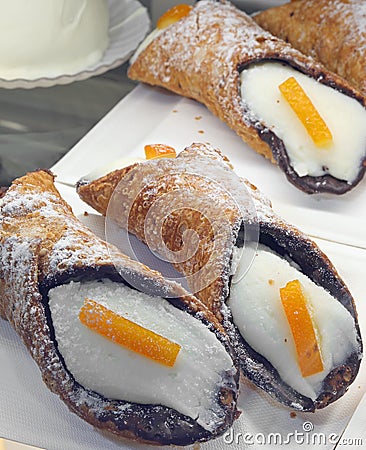 Sicilian cannoli pastries from Southern Italy made with ricotta Cheese and orange Stock Photo