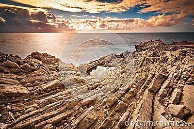 The Sicilian coast at sunset Stock Photo