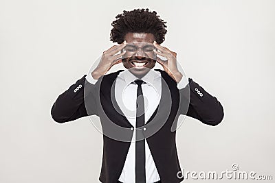 Sick afro man have a headache and migreine. Stock Photo