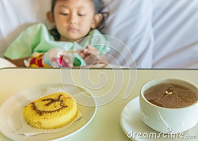 Sick Asian Child Hospital Patient on Bed with Breakfast Meals Menu Stock Photo
