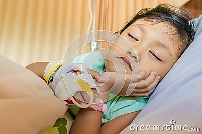 Sick Asian Little Girl Patient Sleeping in Hospital Stock Photo