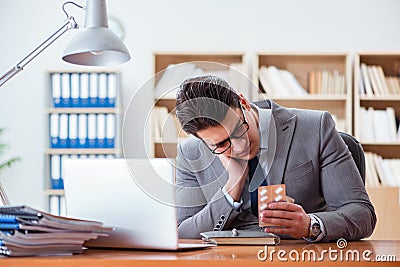 The sick businessman in the office Stock Photo