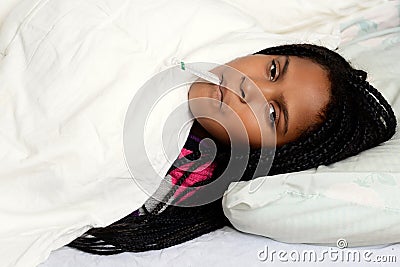Sick child in bed Stock Photo