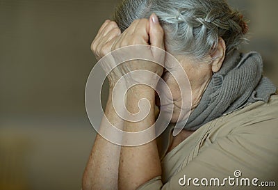 Sick elderly woman Stock Photo