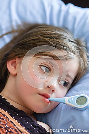 Sick Girl With Fever Stock Photo