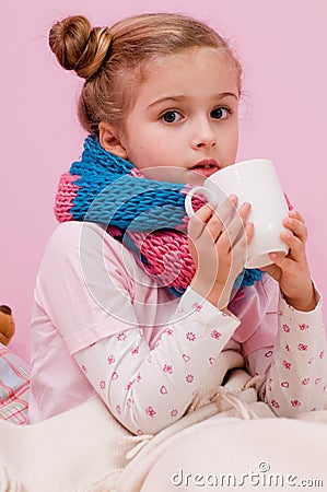 Sick girl with hot tea Stock Photo