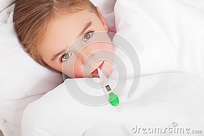 Sick girl resting in bed with fever meassuring temperature with Stock Photo