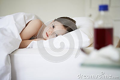 Sick Little Girl Lying In Bed Stock Photo