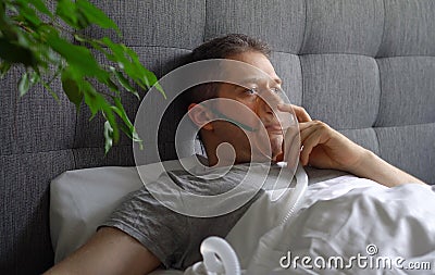 Sick man with inhalator mask Stock Photo