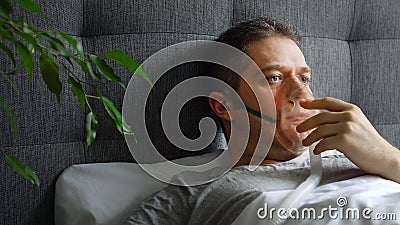Sick man with inhalator mask Stock Photo