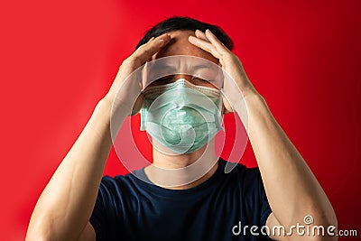 Sick man with mask touch head, virus Infect Stock Photo