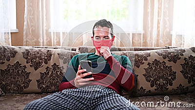 A sick man is quarantined via a mobile video call Stock Photo