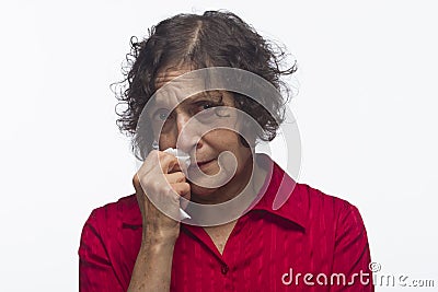 Sick and miserable woman with tissue, horizontal Stock Photo