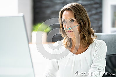 Sick Patient Using Oxygen Cannula Stock Photo