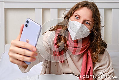 Sick woman blogger takes selfie photo on phone Apple iPhone. Adult il Editorial Stock Photo