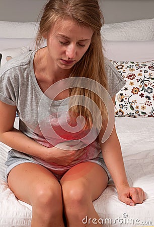 Sick woman having a stomach ache Stock Photo