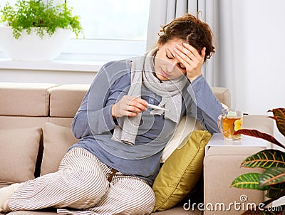 Sick Woman with Thermometer Stock Photo