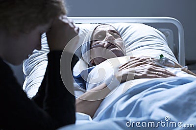 Woman dying in hospital Stock Photo