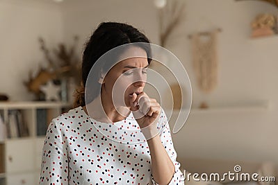 Unhealthy young woman cough having virus symptoms Stock Photo