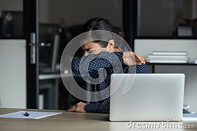 Sick young indian businesswoman suffering from flu grippe coronavirus symptoms. Stock Photo