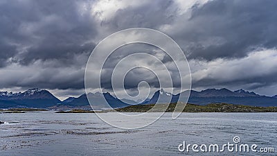 From the side of the Beagle Canal, you can see the beautiful Andes mountain range Stock Photo