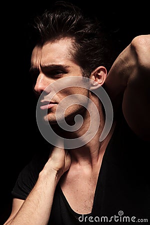 Side closeup picture of a fashion man posing Stock Photo