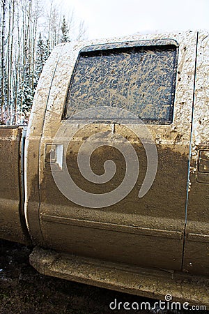 Side door of a truck that has been mud bogging Stock Photo